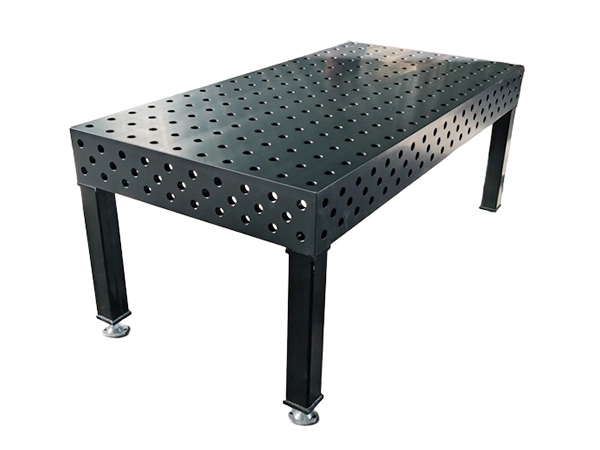 What are the applications of three-dimensional flexible welding tables in manufacturing systems?